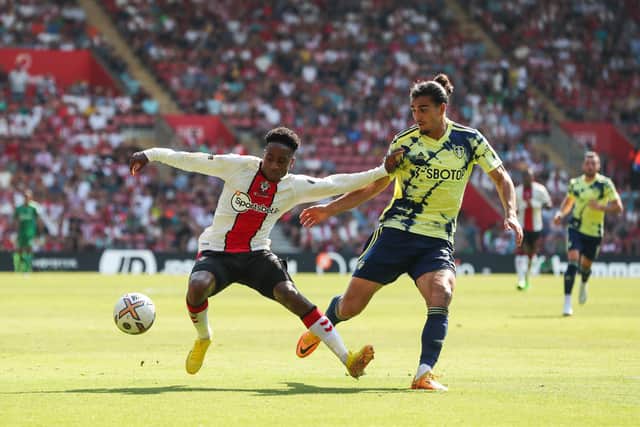 SOUTHAMPTON, ENGLAND - AUGUST 13: Kyle Walker-Peters of Southampton battles for possession with Pascal Struijk of Leeds United during the Premier League match between Southampton FC and Leeds United at Friends Provident St. Mary's Stadium on August 13, 2022 in Southampton, England. (Photo by Henry Browne/Getty Images)