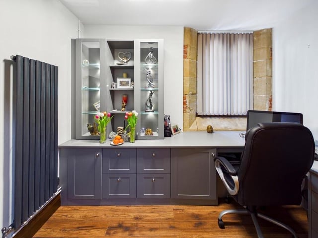 The home office has a central heated radiator and a UPVC double glazed window to the rear elevation.