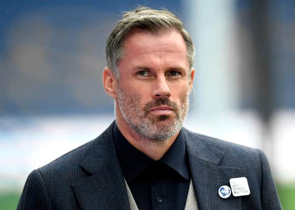 Sky Sports pundit Jamie Carragher looks on during the Premier League match between Everton FC and Liverpool FC at Goodison Park on June 21, 2020 in Liverpool, England.