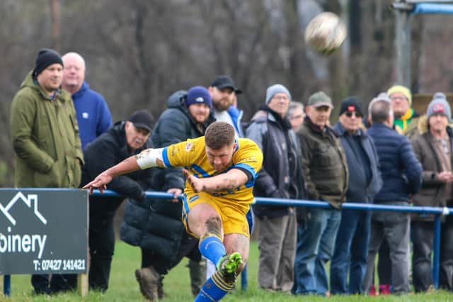 Jordan Gale lands a goal for Hunslet ARLFC in last weekend's Challenge Cup win at Lock Lane. Picture by Alex Shenton.