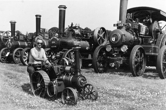 Fred Horseman's model traction engine may not be in the big league like these vintage steamers at the Great Yorkshire Steam Fair in August 1975, but it can certainly hold its own when it comes to engineering craftsmanship. The four and a half inch to the foot scale model of a Burrell steam engine took Mr. Horseman, a dental surgeon, five years to build.