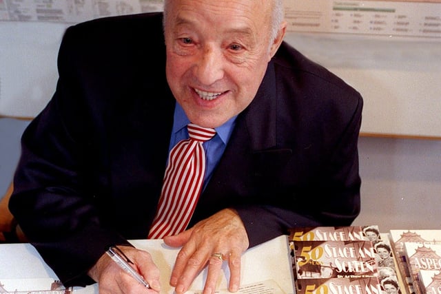 Arthur Riley signs copies of his new book"50 Years of Stage and Screen", at city centre tourist information centre Gateway in November 1999.