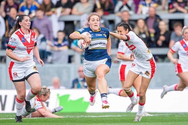 Amy Hardcastle scores for Rhinos against her old club St Helens. Picture by Allan McKenzie/SWpix.com.