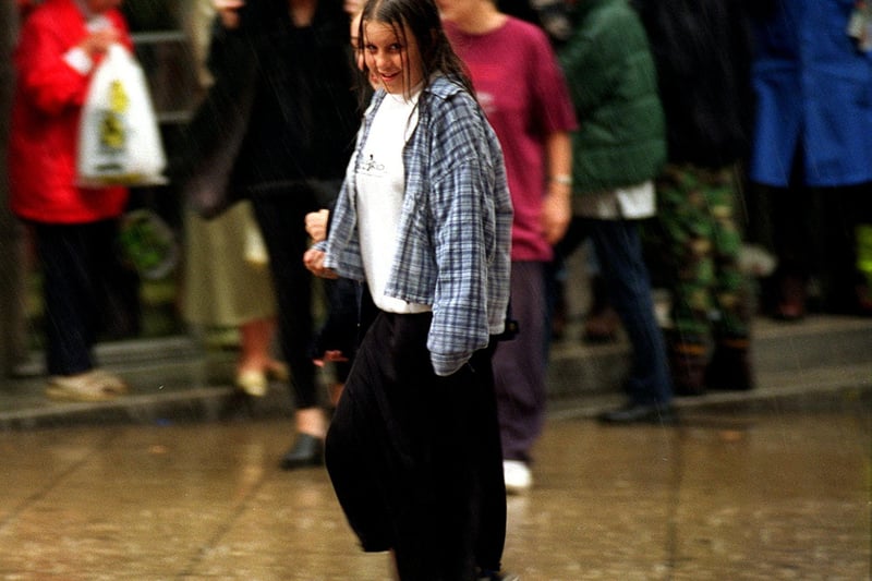 City centre shoppers were caught out by freak rain storms in August 1996.