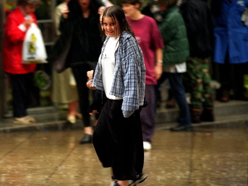 City centre shoppers were caught out by freak rain storms in August 1996.