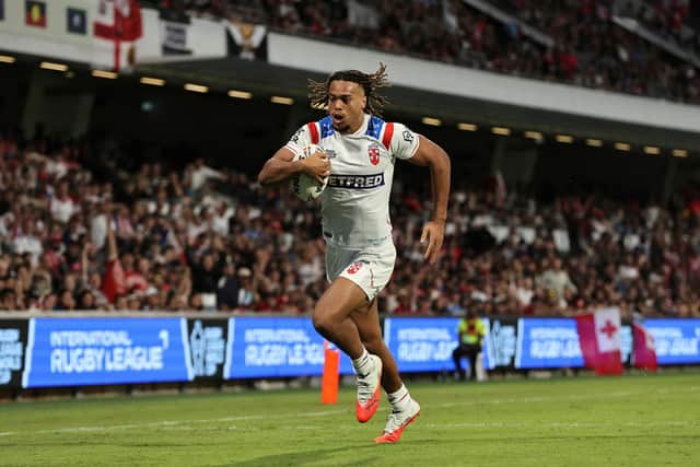 England were beaten 30-12 by Tonga in their World Cup opener, despite this try by Dewsbury-born Dom Young. Picture by Anita Reca/SWpix.com.