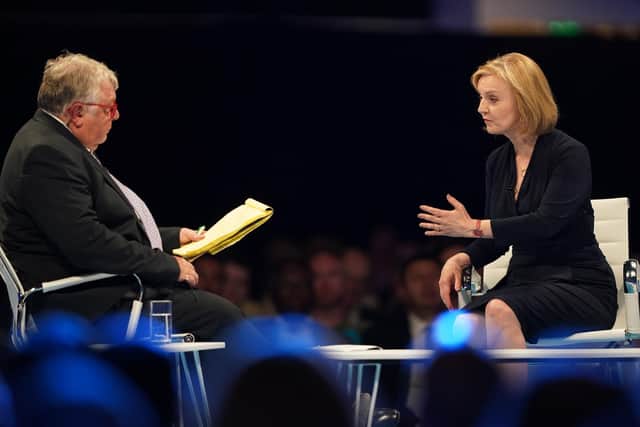 Host Nick Ferrari (left) speaking with Conservative leadership candidate Liz Truss at a hustings event at the Pavilion conference centre at Elland Road in Leeds. Picture date: Thursday July 28, 2022.