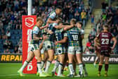 Rhinos celebrate the seventh of their nine tries against Huddersfield, scored by Rhyse Martin. Picture by Bruce Rollinson.