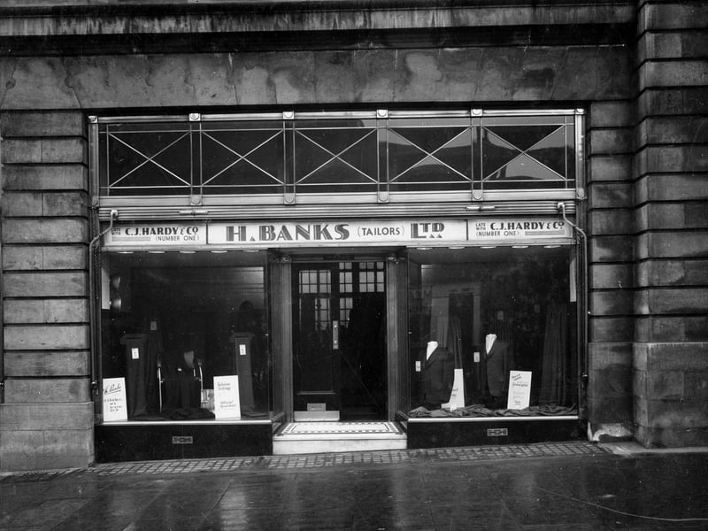 H. Banks, Tailors Ltd, window displays of suits and materials. This property is now part of The Light complex development. Pictured in February 1937.