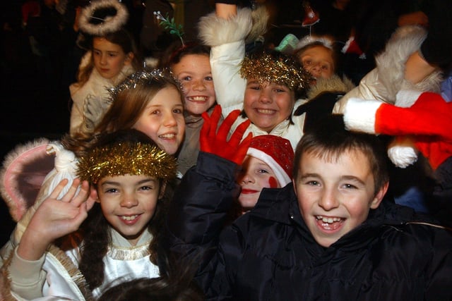 Crowds enjoy the party at Farsley's Christmas Lights switch-on in November 2003.