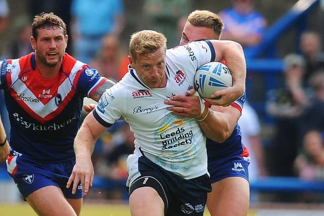 Lachie Miller on the attack for Leeds Rhinos against Wakefield Trinity, before he suffered a calf muscle injury. Picture by Steve Riding.