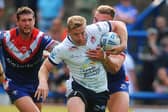 Lachie Miller on the attack for Leeds Rhinos against Wakefield Trinity, before he suffered a calf muscle injury. Picture by Steve Riding.