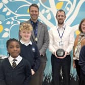 Staff and Pupils from Manston St James CofE Primary Academy receive their award from Julie Edwards, Historic England’s Local Heritage Education Manager for Yorkshire