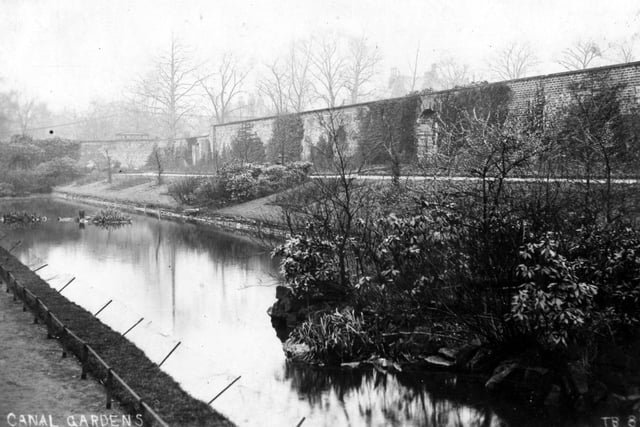 Canal Gardens pictured in 1910, opposite the main Roundhay Park, enclosed garden with displays of seasonal and specimen plants. It is now renowned for the collection of plants and animals called 'Tropical World', also butterflies feature here.