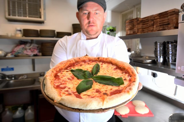 Wood Fire Dine is a pizzeria in Commercial Street, Rothwell. Pictured is owner and award-winning chef Mark Baber.