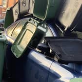 The car was blocking Back Welton Place when it was buried in the bins.