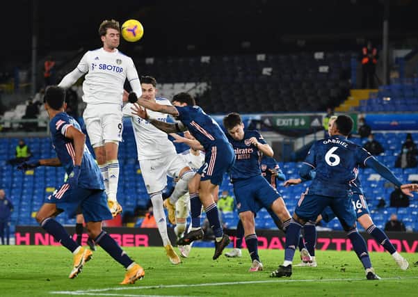 LEEDS, ENGLAND - NOVEMBER 22: Patrick Bamford of Leeds United has a header on goal during the Premier League match between Leeds United and Arsenal at Elland Road on November 22, 2020 in Leeds, England.  (Photo by Paul Ellis - Pool/Getty Images)