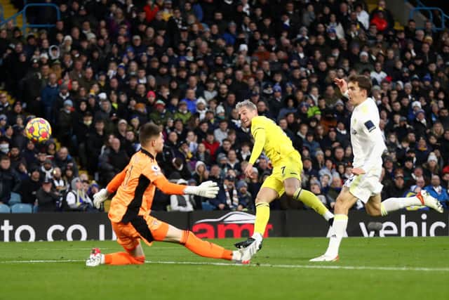 WHITES HISTORY: For Sergi Canos, top, pictured netting against Leeds United for Brentford in the 2-2 Premier League clash draw at Elland Road of December 2021. Photo by George Wood/Getty Images.