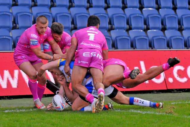 Leeds Rhinos' Harry Newman had this touchdown ruled out by the new video referee bunker in the game against Hull KR. Picture by Steve Riding.