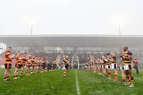 Michael Knowles walks out at the start of his testimonial game between Dewsbury Rams and Huddersfield Giants in January. Picture by Will Palmer/SWpix.com.