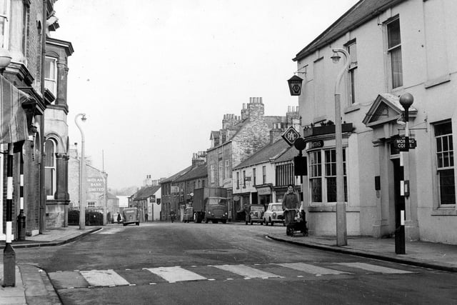 North Street looking north towards the Swan and Talbot Public House (in the background). The Angel Hotel dominates the foreground, right. Both these establishments were principal posting inns in their day and employed 25 servants between them, dealing with the coaching and carrying trade.