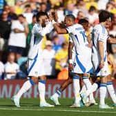 COLLECTIVE: The best Leeds United answer in the absence of a natural no 10, as Joel Piroe celebrates putting the Whites 2-0 up at home to Hull City with Mateo Joseph. Photo by Cameron Smith/Getty Images.