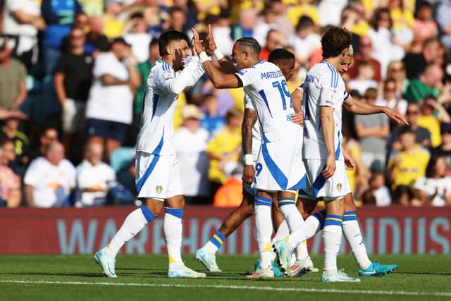 COLLECTIVE: The best Leeds United answer in the absence of a natural no 10, as Joel Piroe celebrates putting the Whites 2-0 up at home to Hull City with Mateo Joseph. Photo by Cameron Smith/Getty Images.
