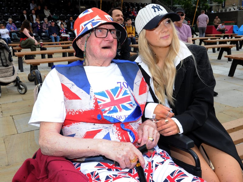 Raymond Beck of Seacroft and his grand daughter April Armitage take up their place for the Royal celebration.