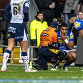 David Fusitu'a is checked over during his Rhinos debut last February. Picture by Tony Johnson.