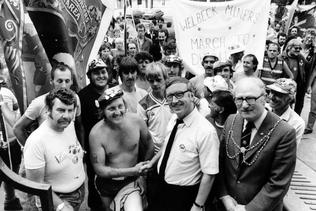 The marching miners are welcomed at Leeds Civic Hall by Leeds City Council leader George Mudie (centre) and deputy Lord Mayor of Leeds, Coun Joe Taylor, in July 1984.