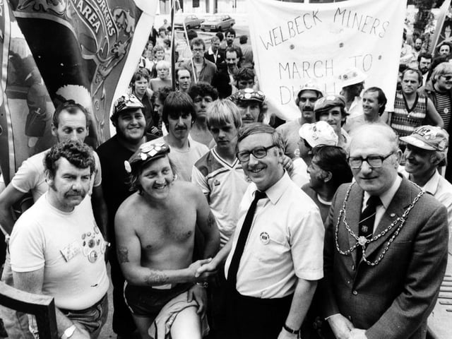 The marching miners are welcomed at Leeds Civic Hall by Leeds City Council leader George Mudie (centre) and deputy Lord Mayor of Leeds, Coun Joe Taylor, in July 1984.