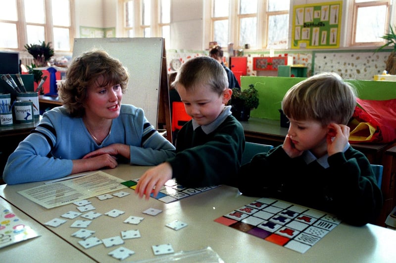 Parent governor Mrs Debbie Burtoyne taking part in the maths games with her son Jack, right, and Dale Campling at Lower Wortley Primary in March 1998.