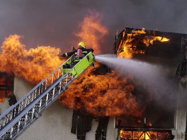 Firefighters tackle the blaze at Crawshaw School, Robin Lane, Pudsey, on July 13, 2001.