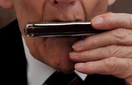 Nelson threatened to assault a man at a bus stop with a harmonica. (pic by National World)