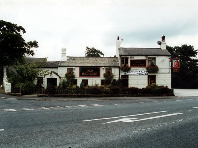 The Old Red Lion on York Road at Whinmoor. The colourfully painted pub sign depicting a lion's head hangs on the corner of the building. It was the first Inn after the toll bar on the turnpike at Whinmoor, stage coaches used the Old Red Lion on route to and from York. It closed in 2021.