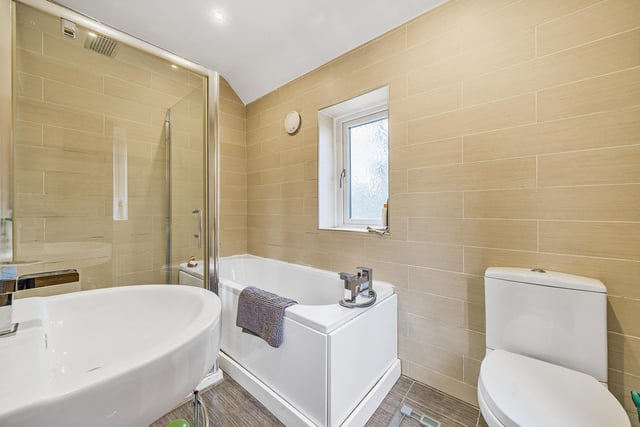 The bedrooms are accompanied by a house bathroom with a four piece suite in white.