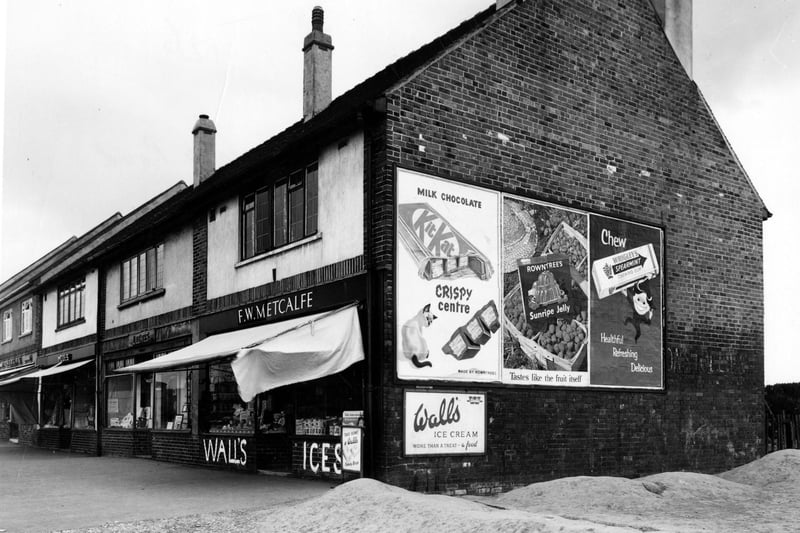 A parade of shops on north side of Middleton Park Road in May 1956.