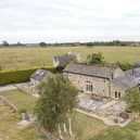 This impressive barn conversion has a price tag of £2,250,000.