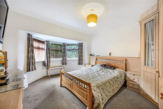 To the first floor are five double bedrooms with the main bedroom and the second bedroom sharing a connecting part-tiled en-suite shower room.