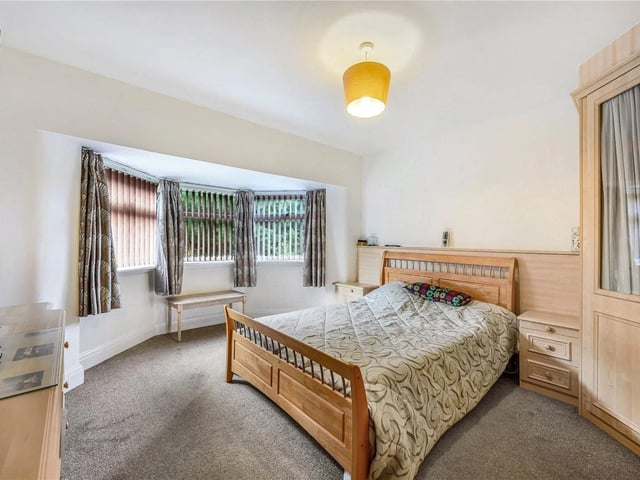To the first floor are five double bedrooms with the main bedroom and the second bedroom sharing a connecting part-tiled en-suite shower room.
