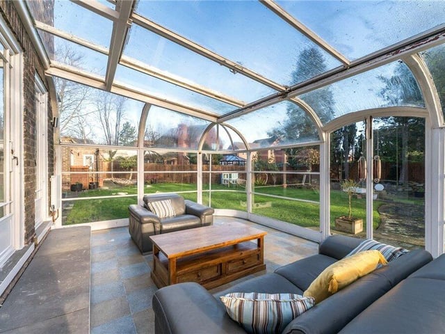 Also on the ground floor is a generous conservatory with a sliding roof.