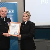 PC Gemma Brown receiving the Solving Problems with Partners Award from Chief Superintendent Steve Dodds. Photo: West Yorkshire Police