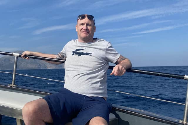 Leeds dad John Granahan, who was diagnosed with Parkinson's at 21, on holiday in Gran Canaria last year when he went on a jet ski