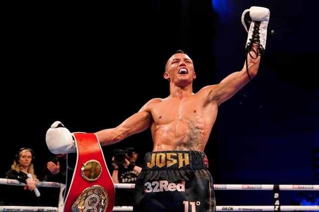 Josh Warrington celebrates winning his IBF world featherweight title fight against Kiko Martinez at the First Direct Arena, Leeds, last year. Picture by Martin Rickett/PA Wire.