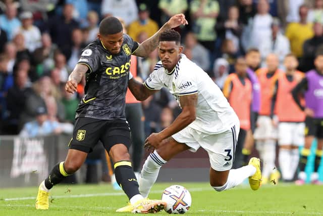 UPDATE: On Leeds United left back Junior Firpo, right, pictured on his Whites comeback last weekend against Aston Villa. Photo by NIGEL RODDIS/AFP via Getty Images.