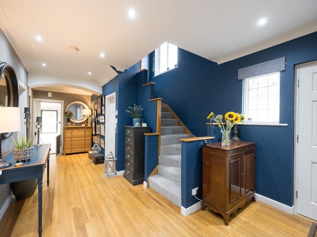 The hallway with staircase to the first floor.