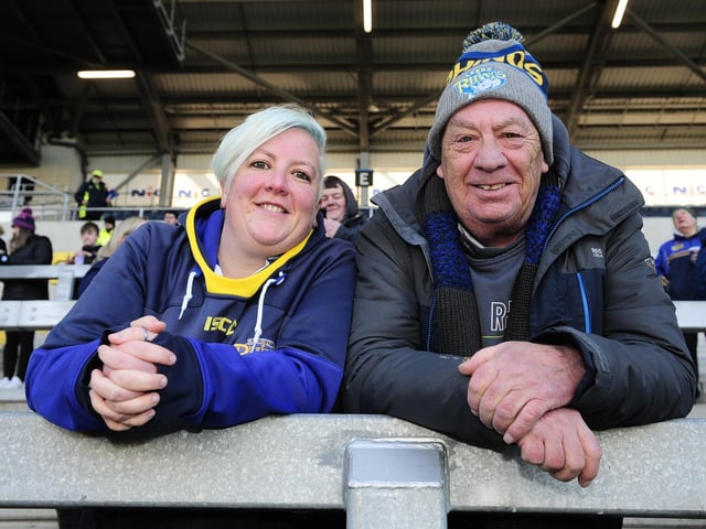 Two fans in the South Stand before Rhinos' 41-22 defeat of Wakefield Trinity on Boxing Day.