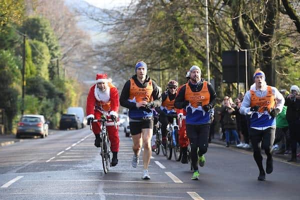 Kevin Sinfield, left, during the last of his seven marathons in as many days in December, 2020. Picture by Simon Wilkinson/SWpix.com.