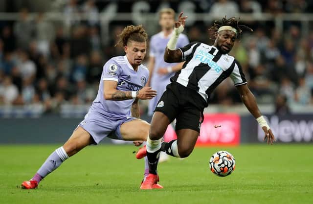 Kalvin Phillips of Leeds United and Allan Saint-Maximin of Newcastle United. (Photo by Ian MacNicol/Getty Images)