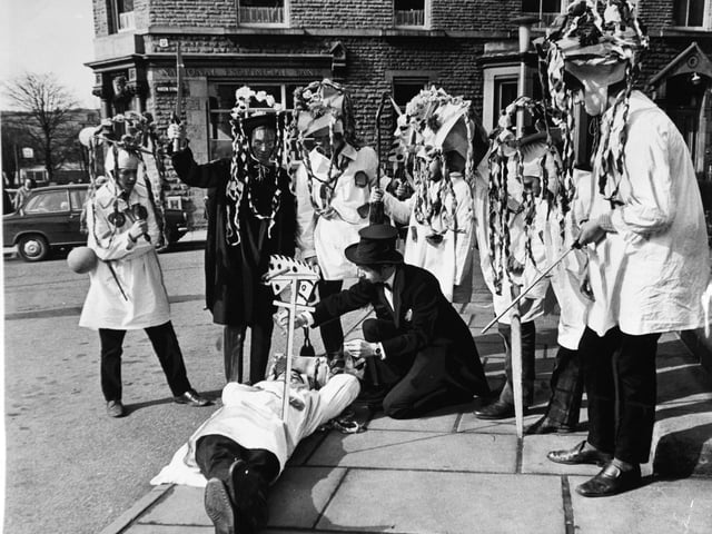 Players of Brighouse Children's Theatre give their 'Pace Egg' performance in Mirfield town centre in March 1970.
